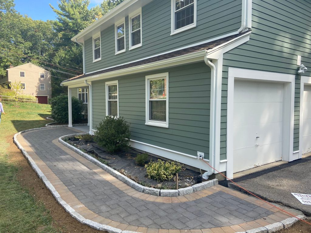 Freshly remodeled home with landscaping for an enhanced curb appeal.