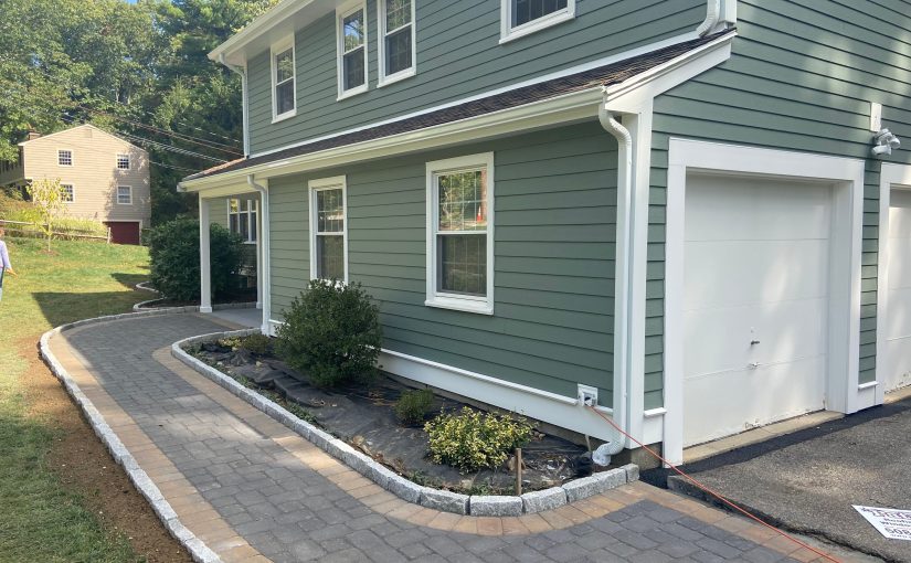 Freshly remodeled home with landscaping for an enhanced curb appeal.